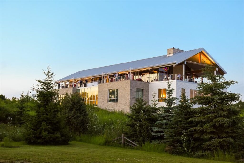 The Kress Pavillion with people enjoying the outdoor deck